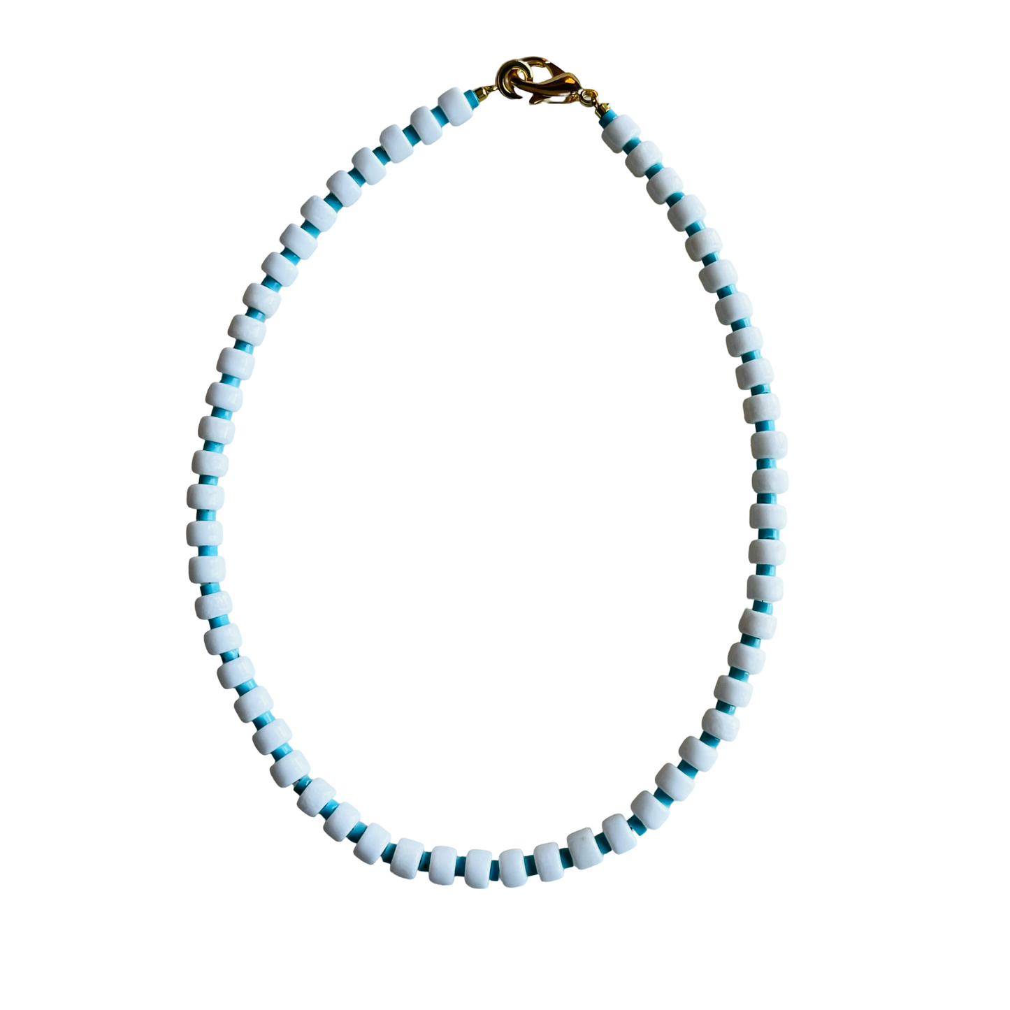 Necklace with white and blue beads on a white background