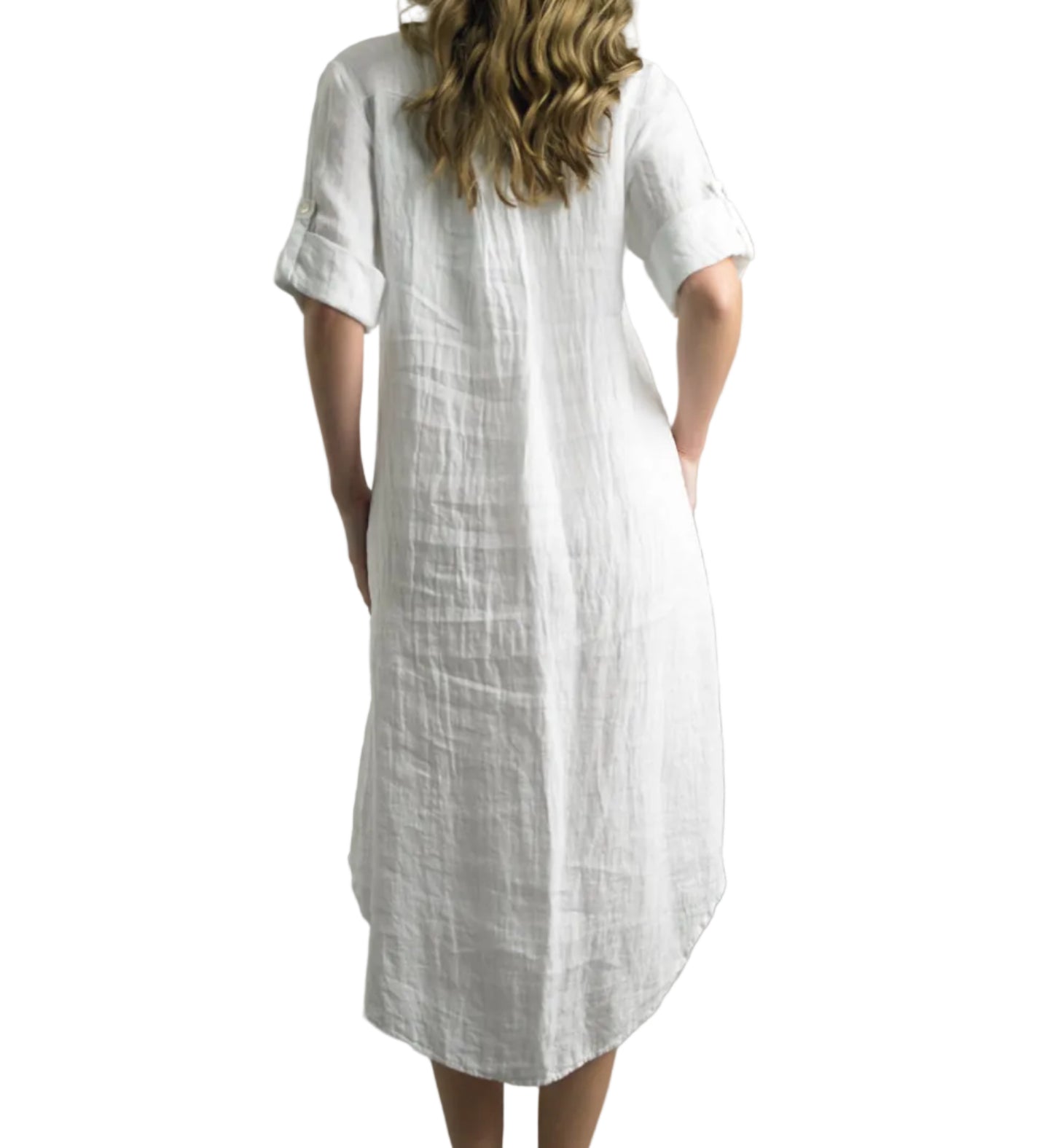 Woman wearing a white dress with short sleeves on a gray background