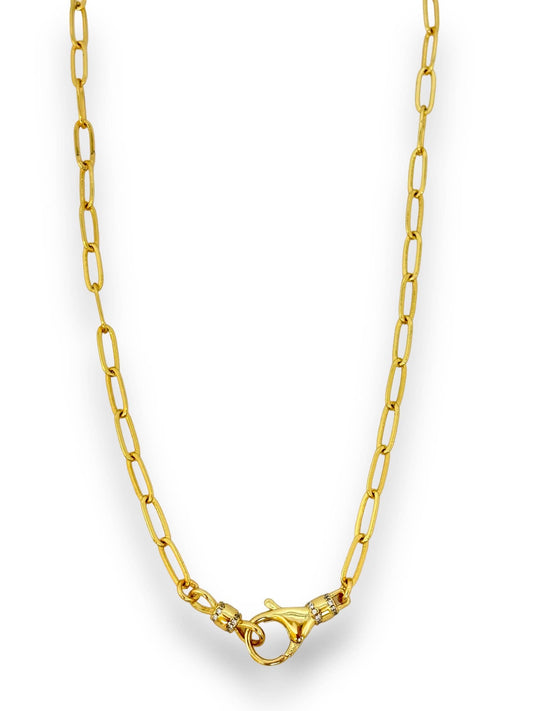Gold chain necklace on a white background