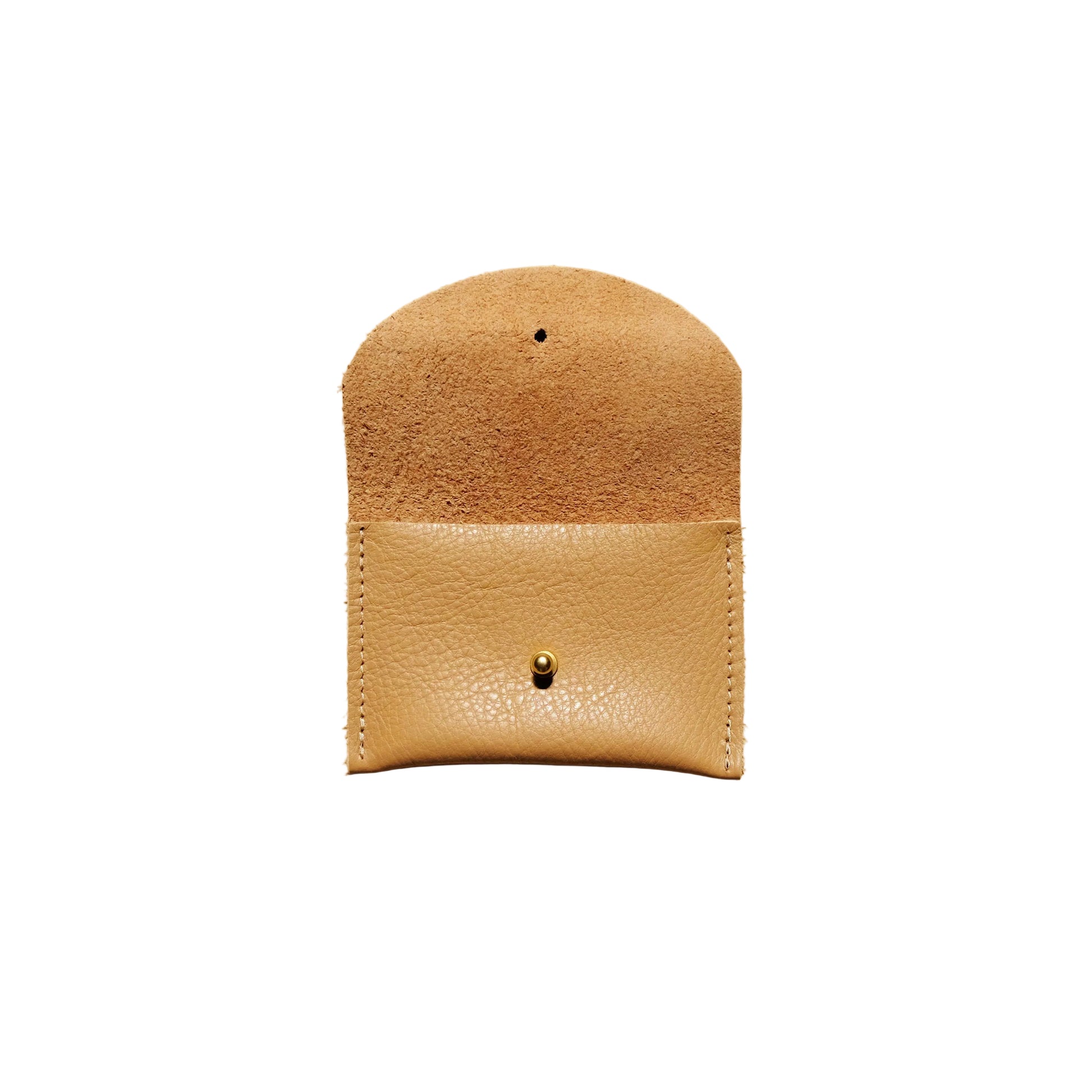 Beige leather pouch on a beige background