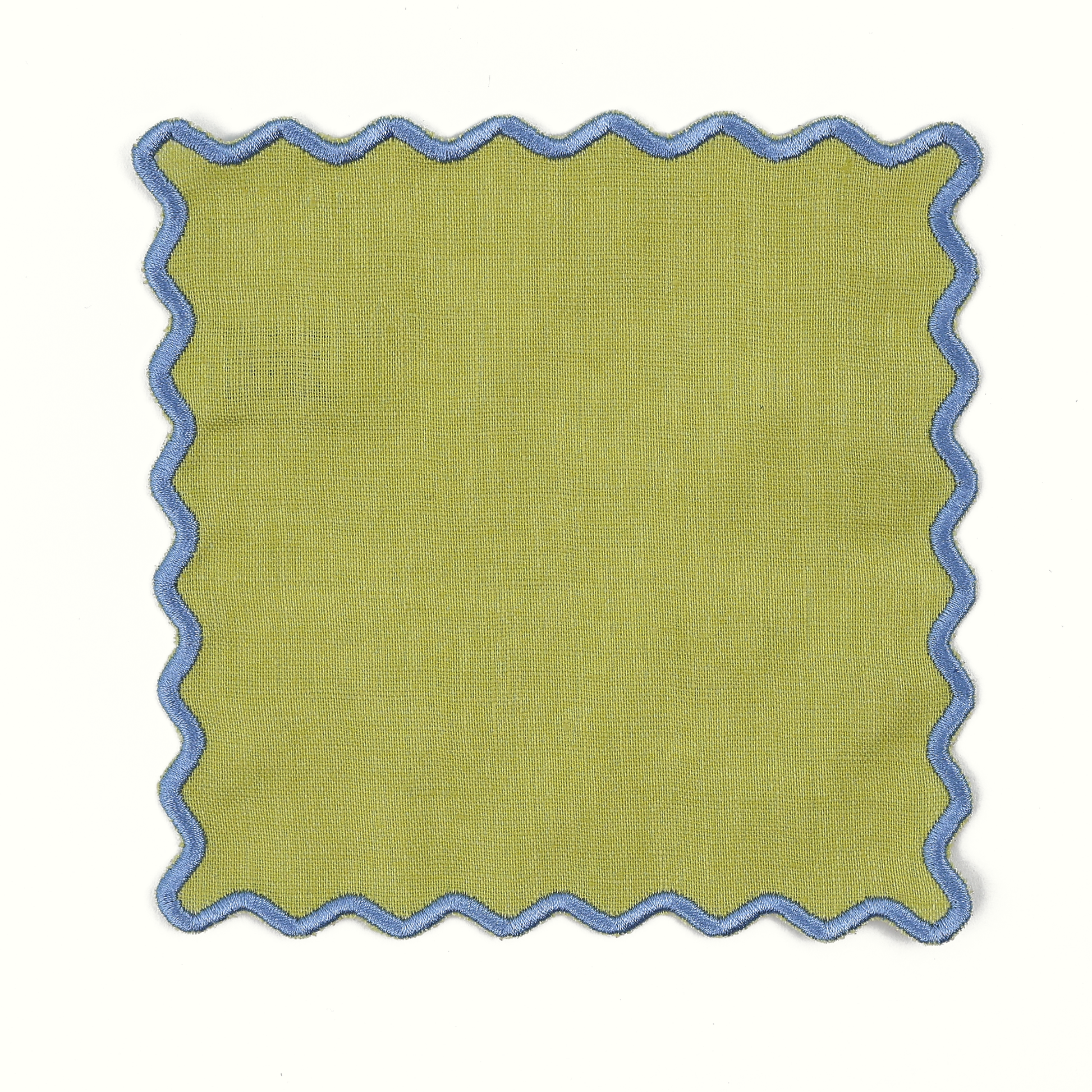 Green fabric swatch with blue scalloped edge on a white background