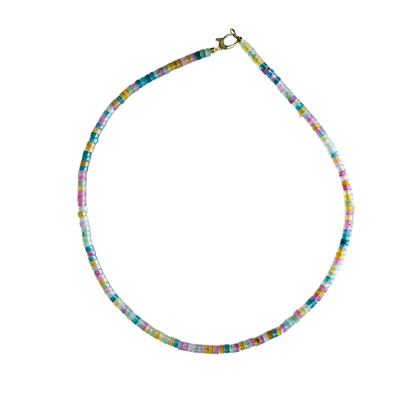 Colorful beaded necklace on a white background