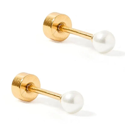 Pair of gold earrings with white pearls on a white background