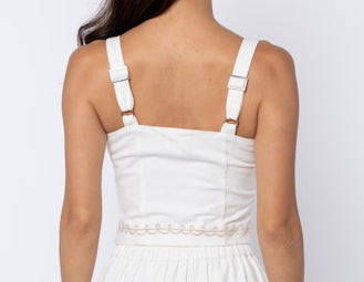 White dress with thin straps on a white background
