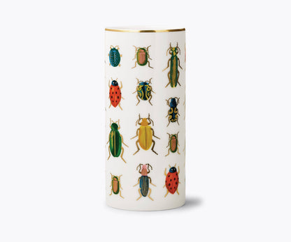 Cylindrical container with beetle illustrations on a white background