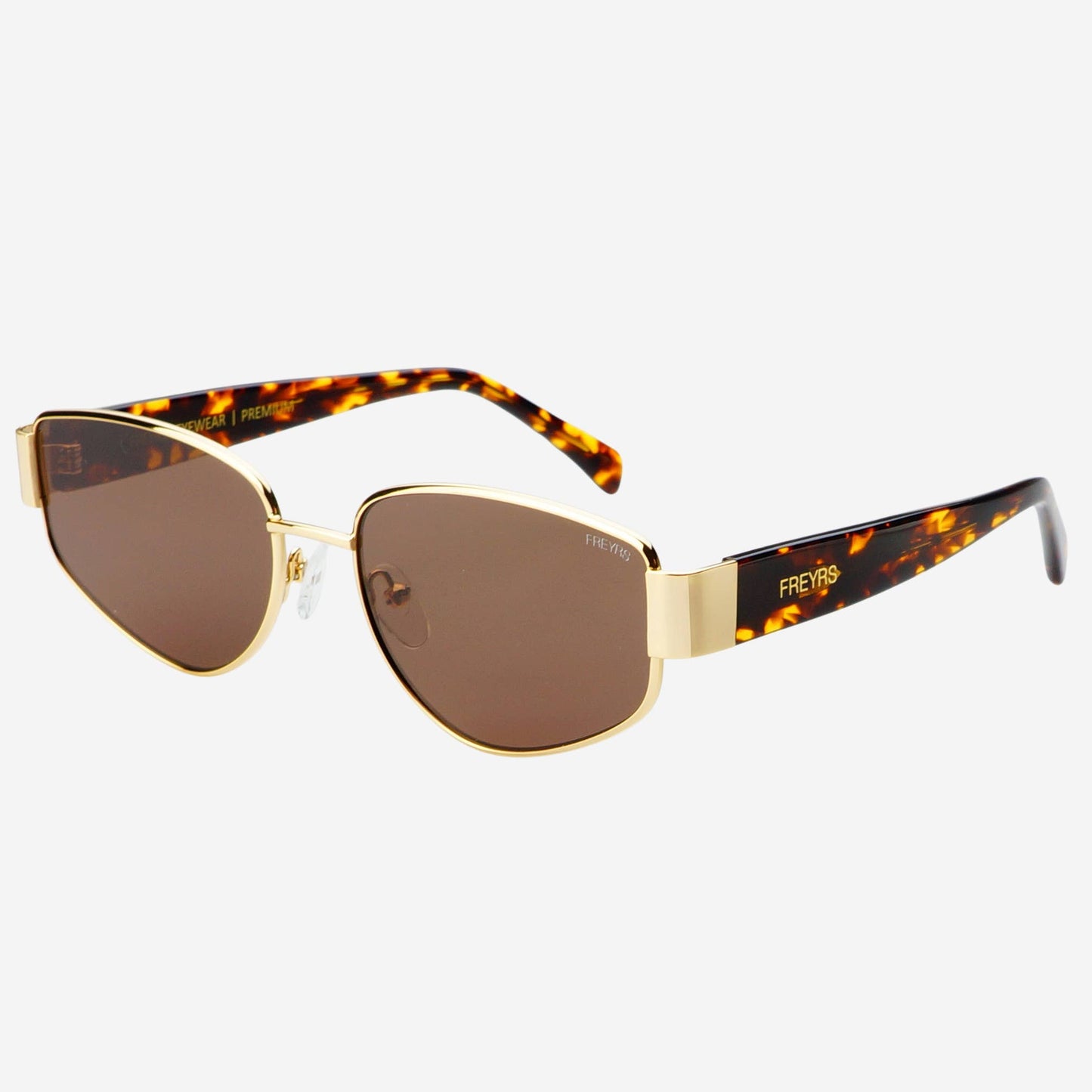 Sunglasses with gold frame and tortoiseshell accents on a white background