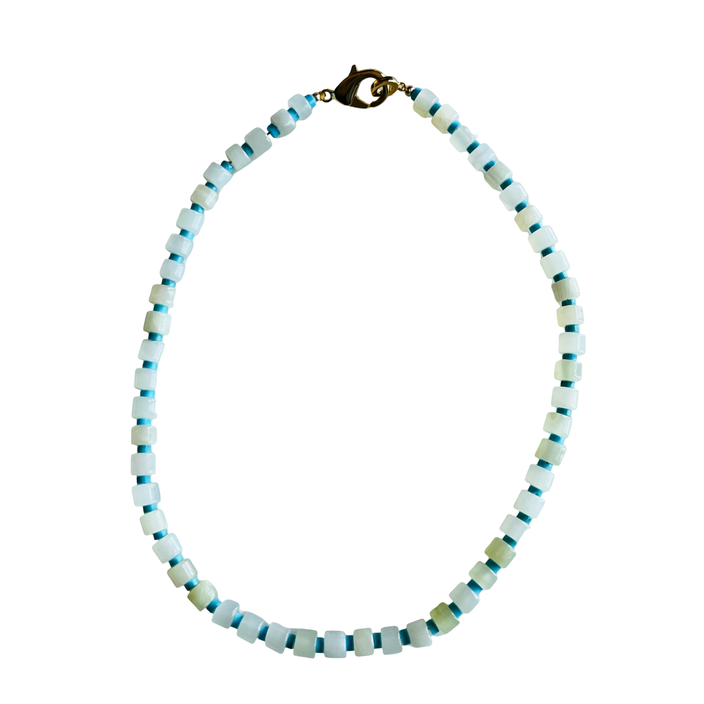 Necklace with white and blue beads on a white background