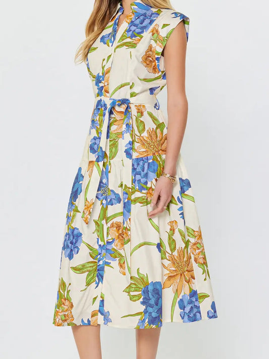 Woman wearing a floral dress on a white background