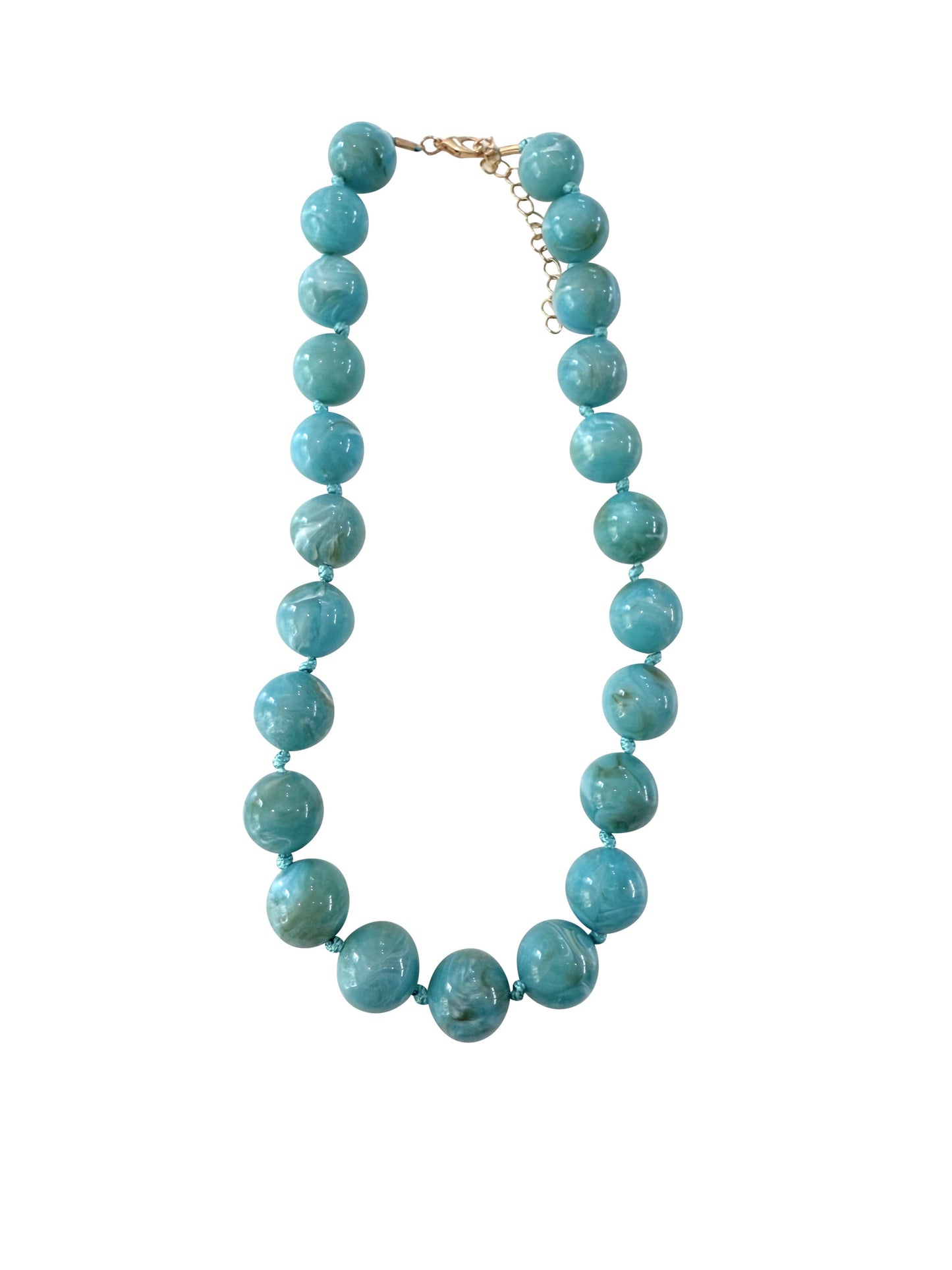 Turquoise beaded necklace on a white background