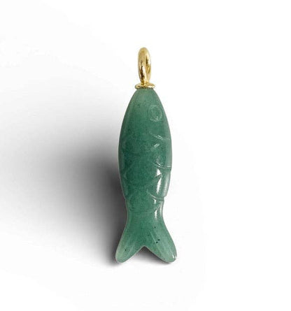 Green fish-shaped pendant with gold chain on a white background