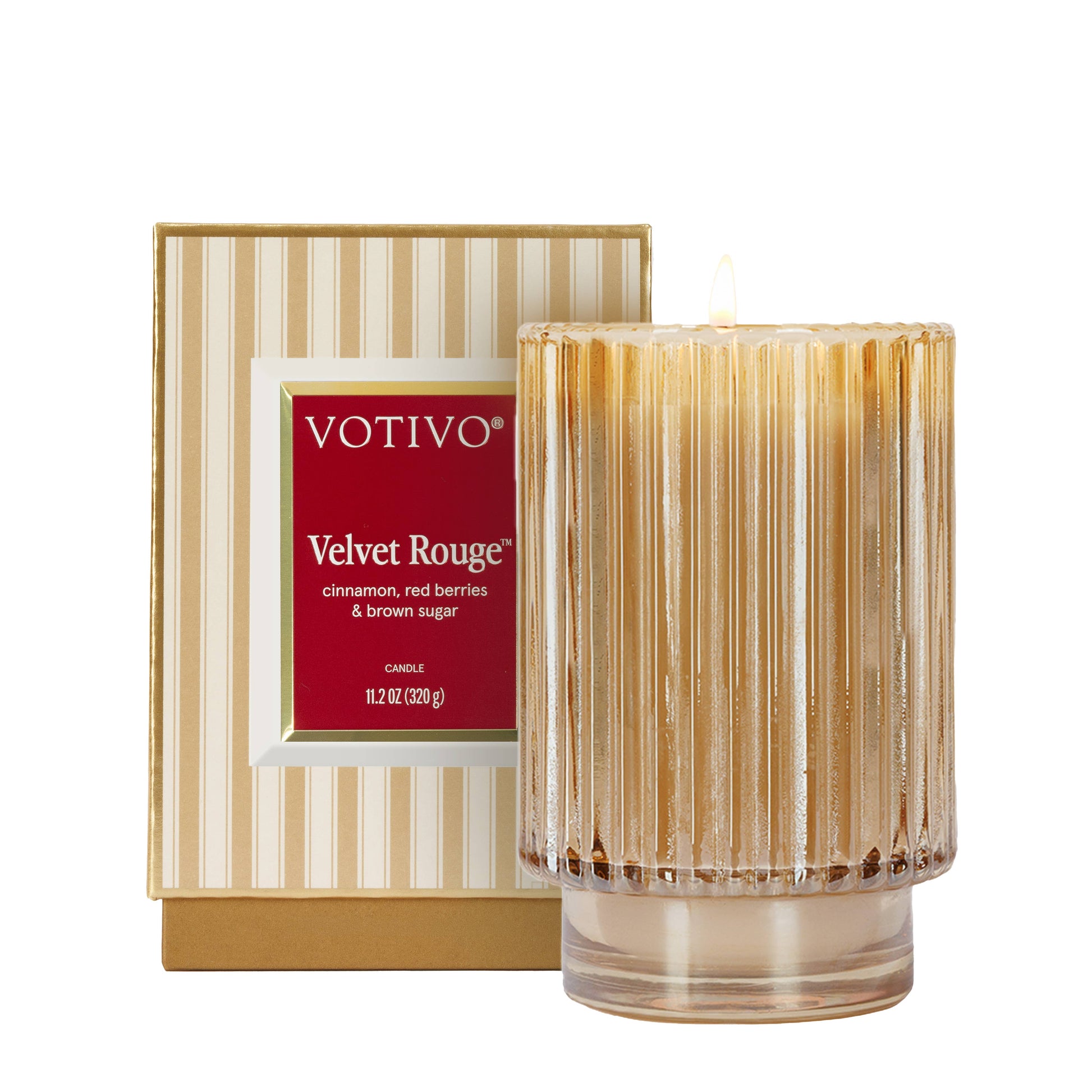 Votivo Velvet Rouge candle with packaging on a white background