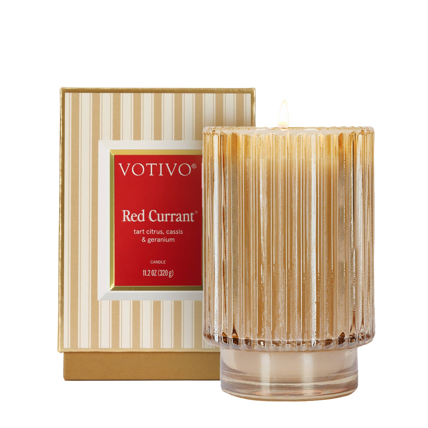 Votivo Red Currant candle with packaging on a white background