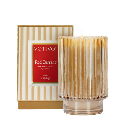 Votivo Red Currant candle with packaging on a white background