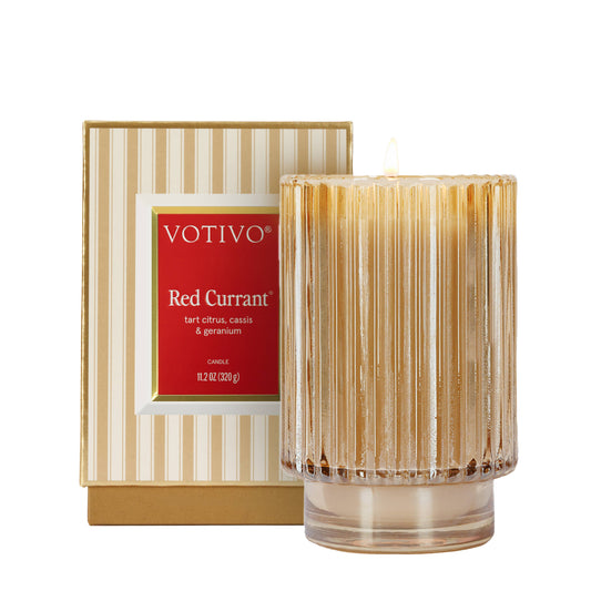 Votivo Red Currant candle with packaging on a white background