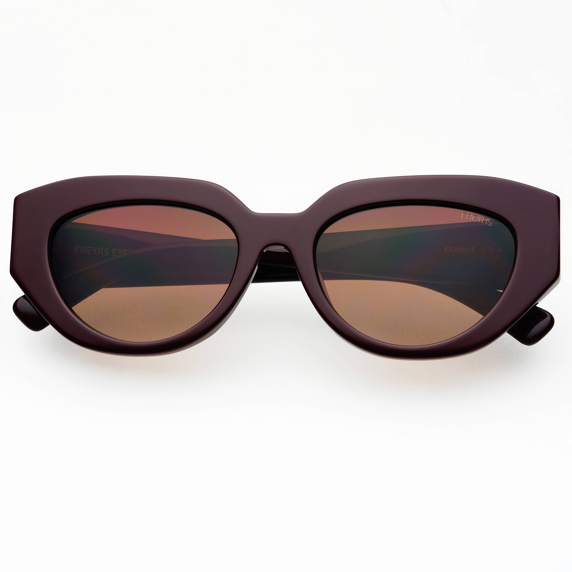 Sunglasses with a dark brown frame and lenses on a white background