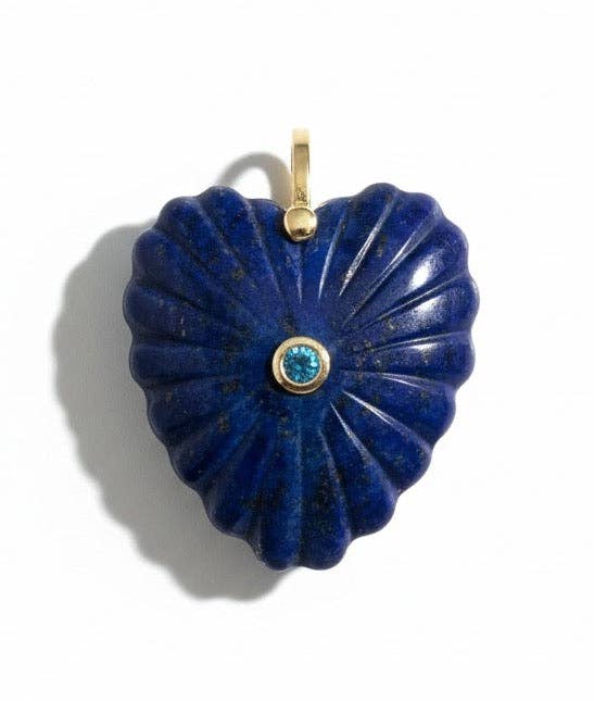 Blue stone pendant with gold chain on a white background
