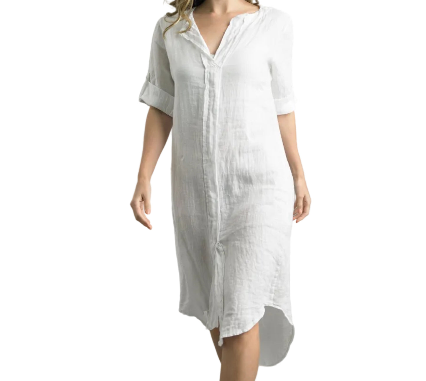 Woman wearing a white dress against a gray background
