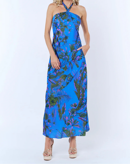 woman wearing silky blue halter dress