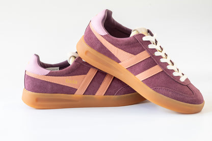 Pair of wine sneakers with Terracotta  accents on a white background