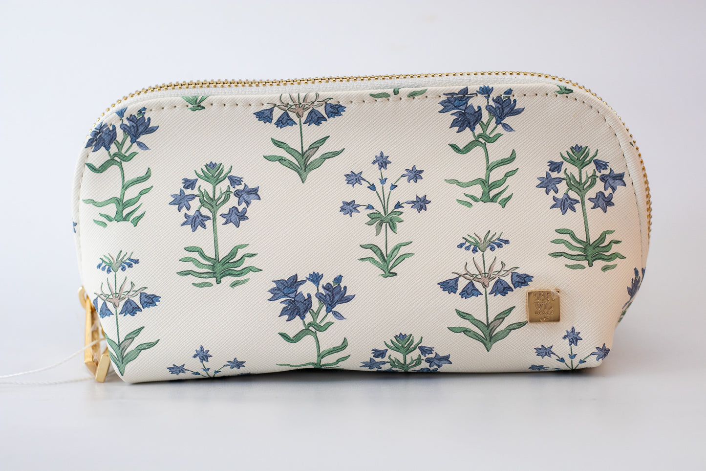 Cosmetic bag with floral pattern on a white background