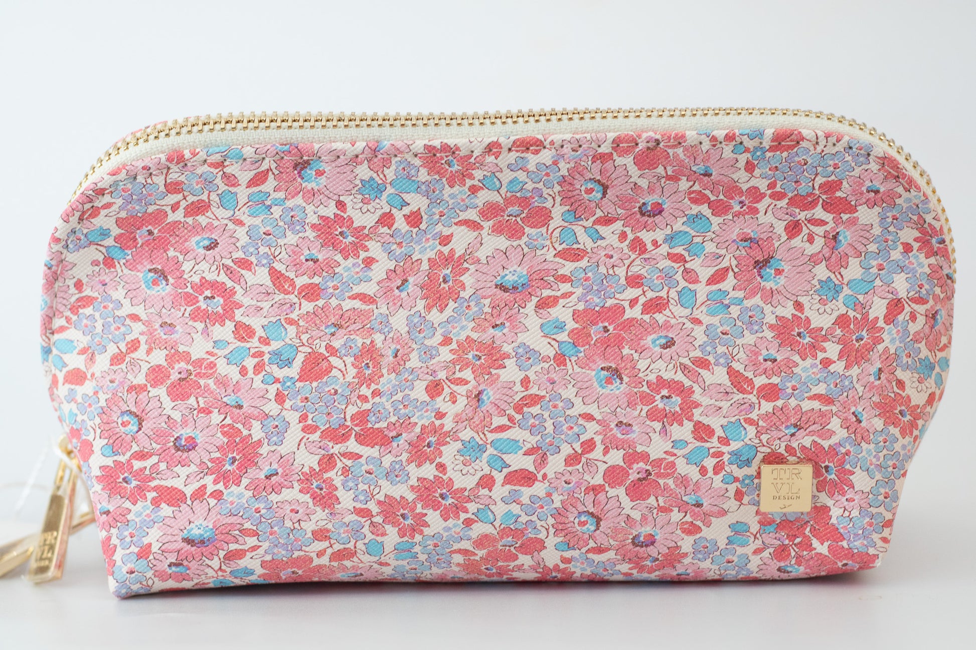 Floral patterned pouch with a visible brand logo on a white background