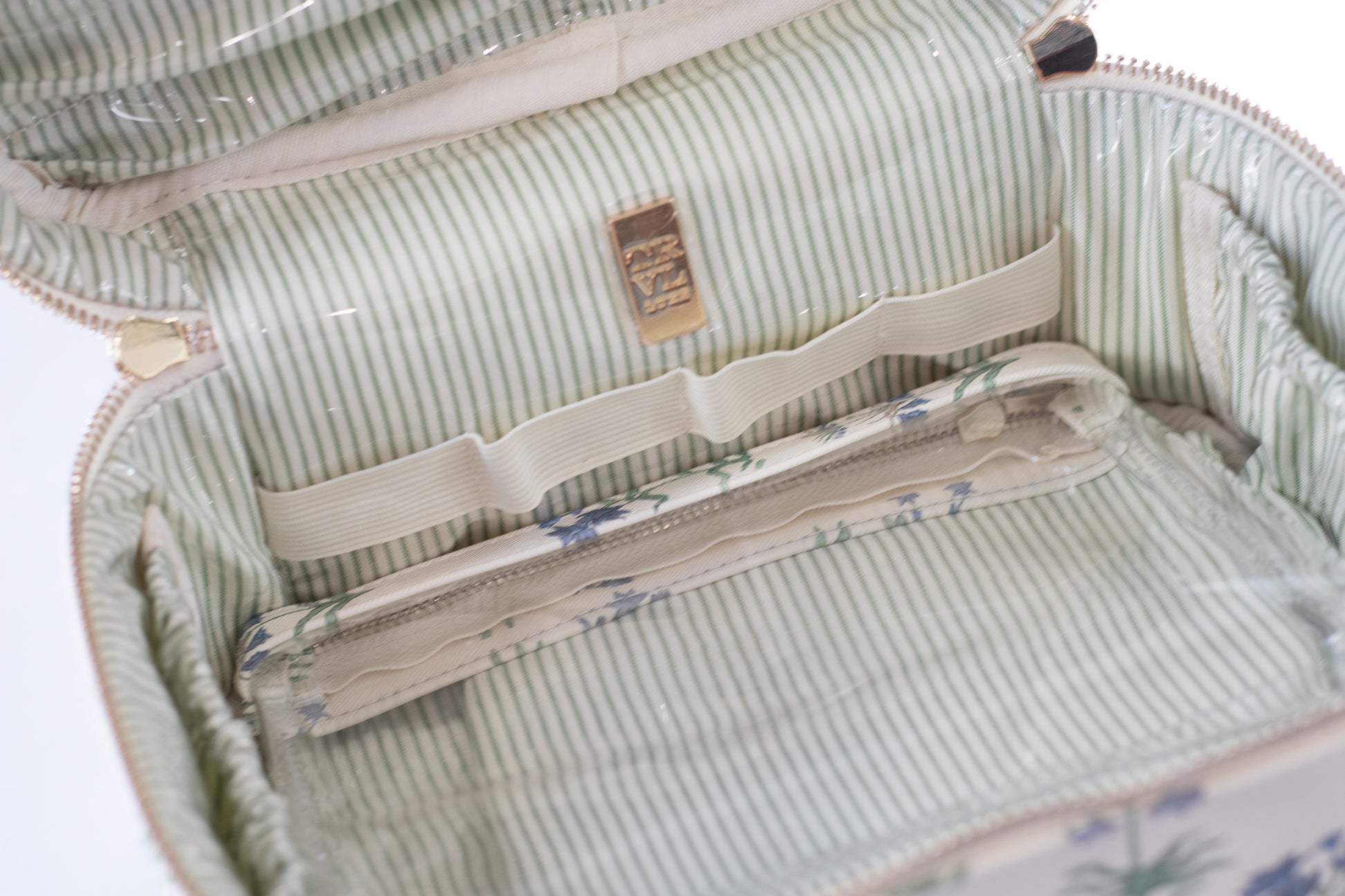 Close-up of a striped fabric bag with a visible brand label.