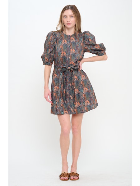 Woman wearing a floral dress on a white background