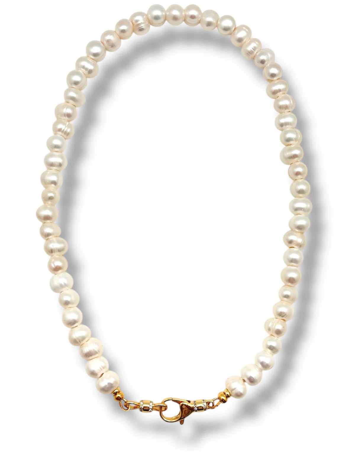 Pearl necklace with a gold clasp on a white background