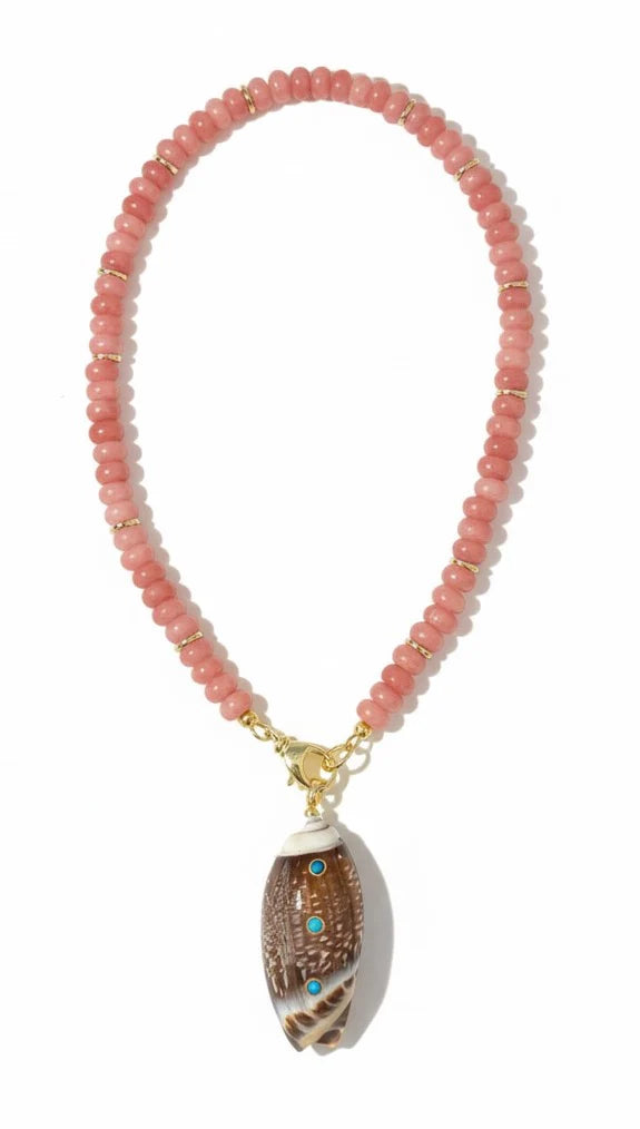 Necklace with pink beads and a shell pendant on a white background