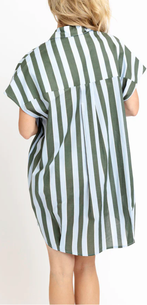 A woman viewed from behind wearing a short-sleeve button-up shirt dress with vertical olive green and white stripes, set against a plain white background.