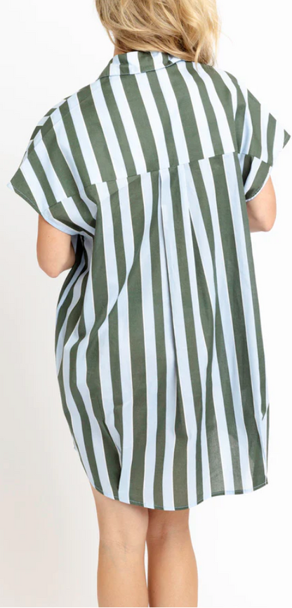 A woman viewed from behind wearing a short-sleeve button-up shirt dress with vertical olive green and white stripes, set against a plain white background.