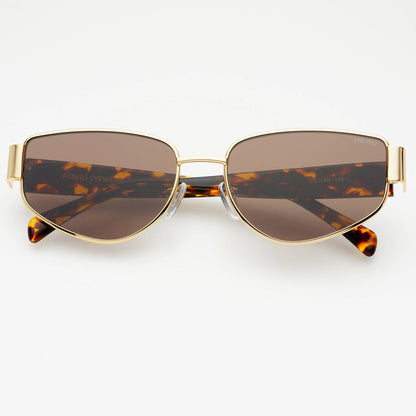 Sunglasses with gold frame and tortoiseshell accents on a white background