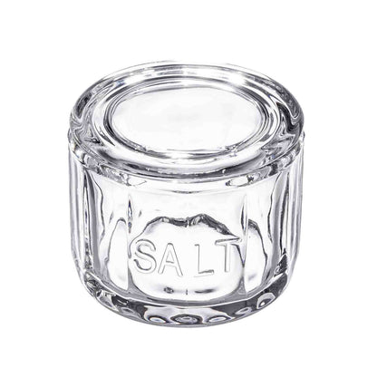 Clear glass jar labeled 'SALT' on a white background