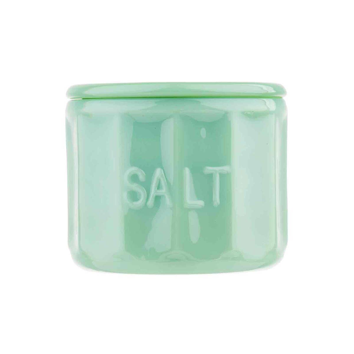 Green salt container on a white background