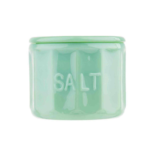 Green salt container on a white background