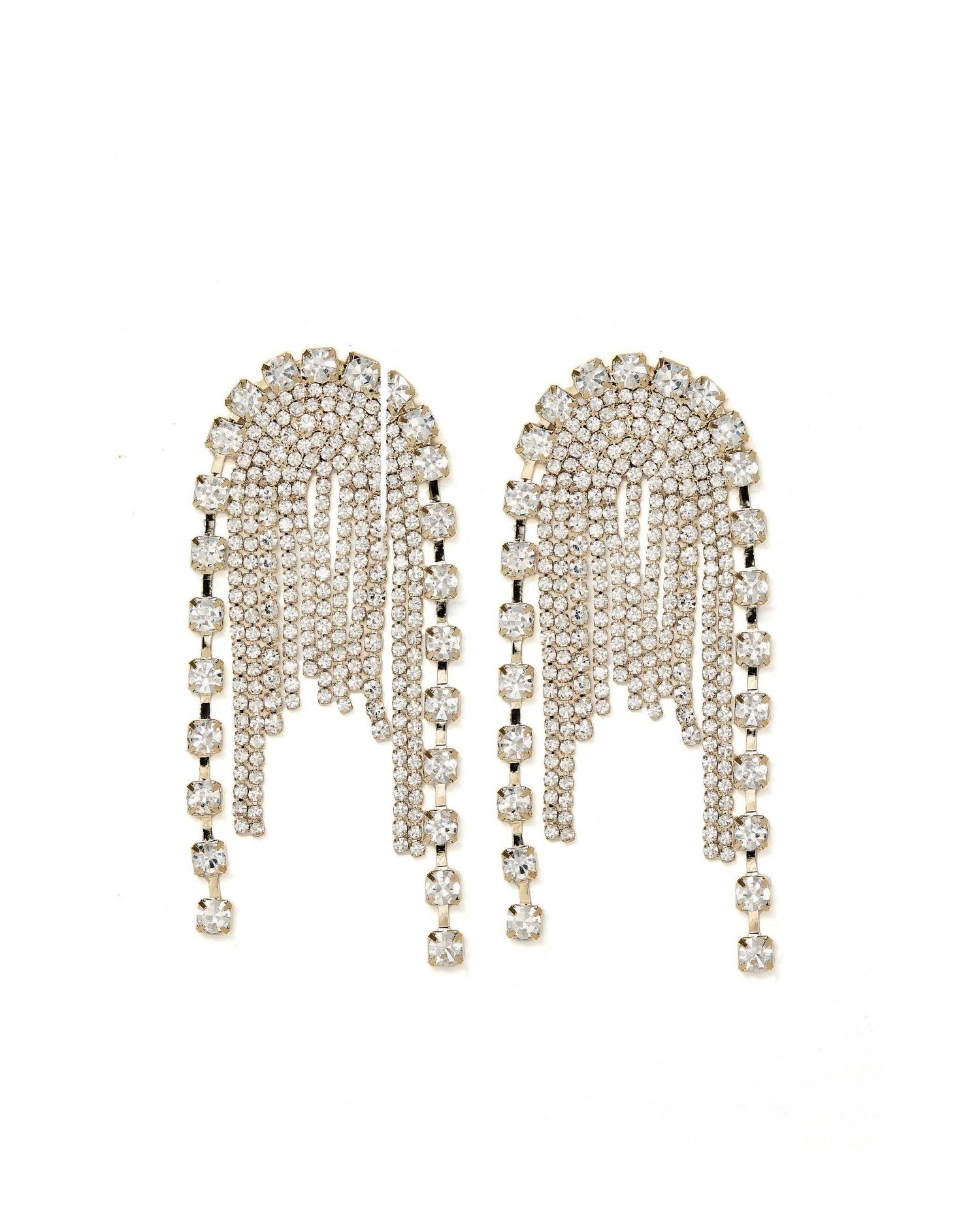 Pair of ornate earrings with dangling beads on a white background