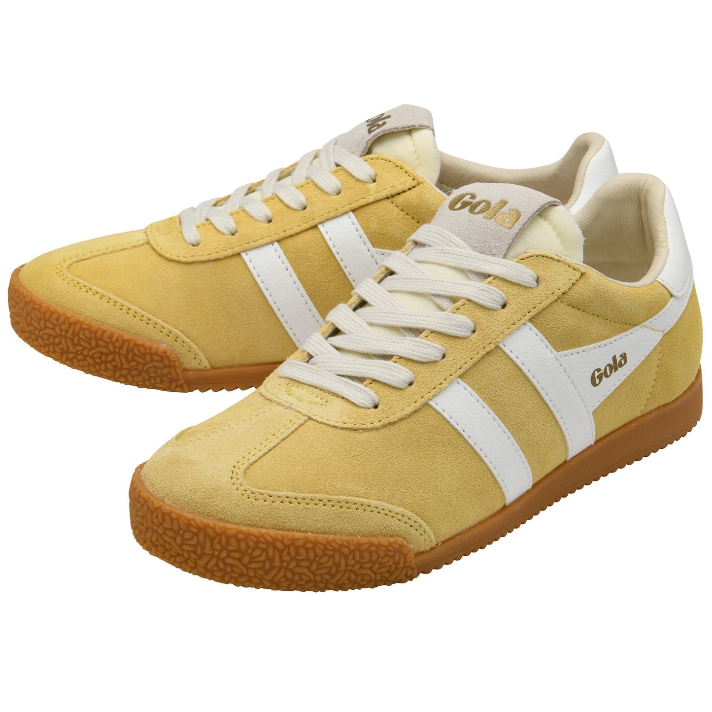 Yellow sneakers with white laces and accents on a white background