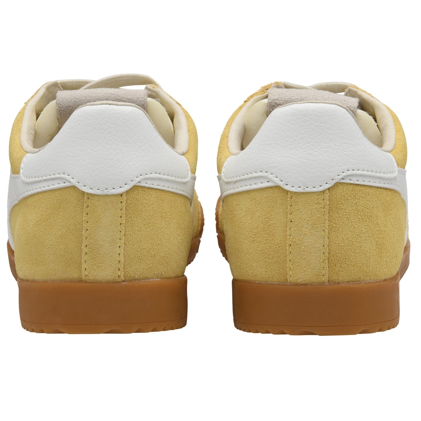 Pair of yellow sneakers with white soles on a white background