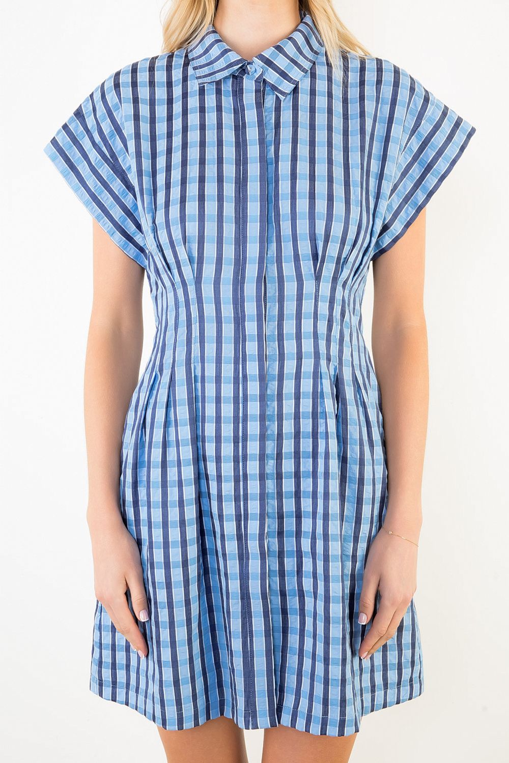 woman wearing plaid mini dress