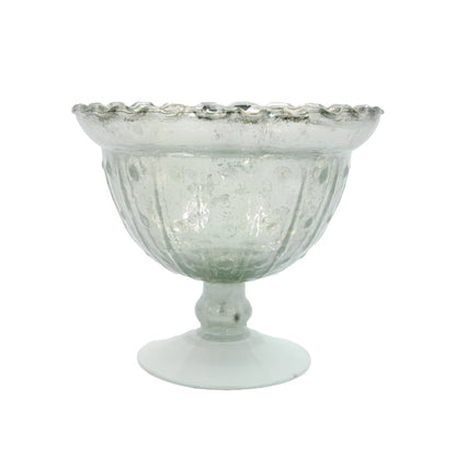 Decorative glass bowl with textured surface on a white background